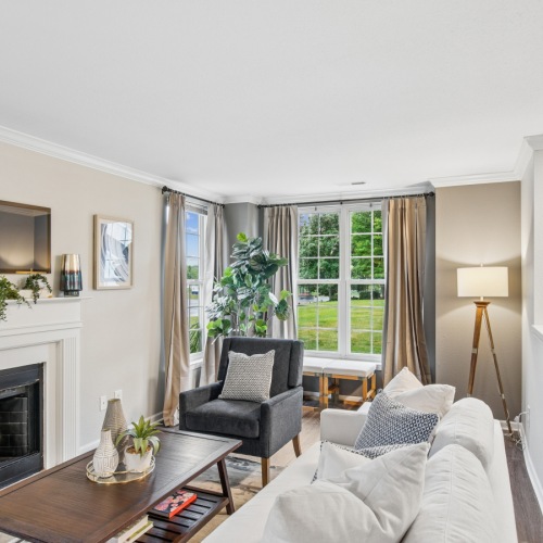 a living room with a fireplace